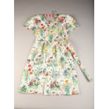 Vintage Gucci Cotton Tea dress and belt ( size 46) with a Bessi 1970s Silk dress with Angel