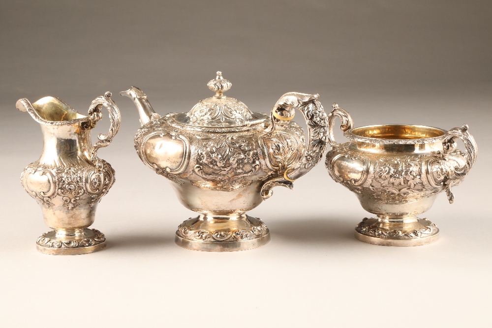 Victorian three piece silver tea service comprising of a teapot, sugar bowl and cream jug, with