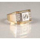 Gents 14 carat yellow and white gold dress ring, central half carat cubic zirconia, flanked by six