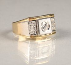 Gents 14 carat yellow and white gold dress ring, central half carat cubic zirconia, flanked by six