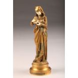 After Albert Carrier - Belleuse (French 1824-1887) gilt bronze figure of a woman reading from a