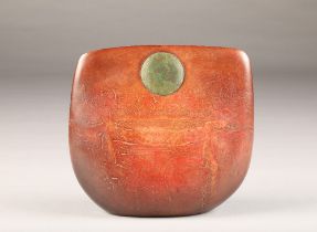Peter Hayes (British Born 1946) A raku bow with fractured red surface and green disc, incised