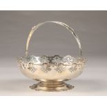 1920's Pierced silver basket with swing handle, assay marked Birmingham 1921 by Docker and Burn Ltd,