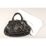 Black quilted clasp Marc Jacobs handbag with red interior with Marc Jacobs dust bag