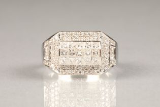 18 carat white gold gents diamond ring set with, princess and brilliant cut diamonds,