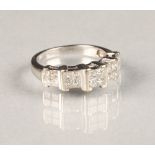 18 carat white gold diamond ring, set with five squares, each square set with four princess cut