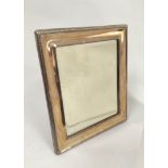 Rectangular easel mirror with beaded silver mount, by Walker & Hall, Birmingham, 1921, 33cm x 28cm.