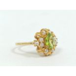 Peridot and pearl oval cluster ring, in 9ct gold, size 'Q', 4g.