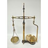 Set of antique brass and cast iron shop balance scales, marked for Co-Op Birmingham, to weigh 7lb,