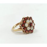 Opal and garnet circular cluster gold ring, size 'P', 3.6g.