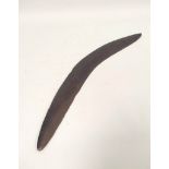 Antique Tribal Art Australian Aboriginal carved boomerang, with incised decoration, 59cm long.