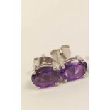 Pair of amethyst ear studs in silver.