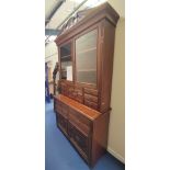 Late Victorian mahogany secretaire bookcase on sideboard base, the bookcase section with scroll