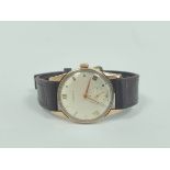 Gent's Longines 9ct gold watch, No 7610026, 1948, on strap.