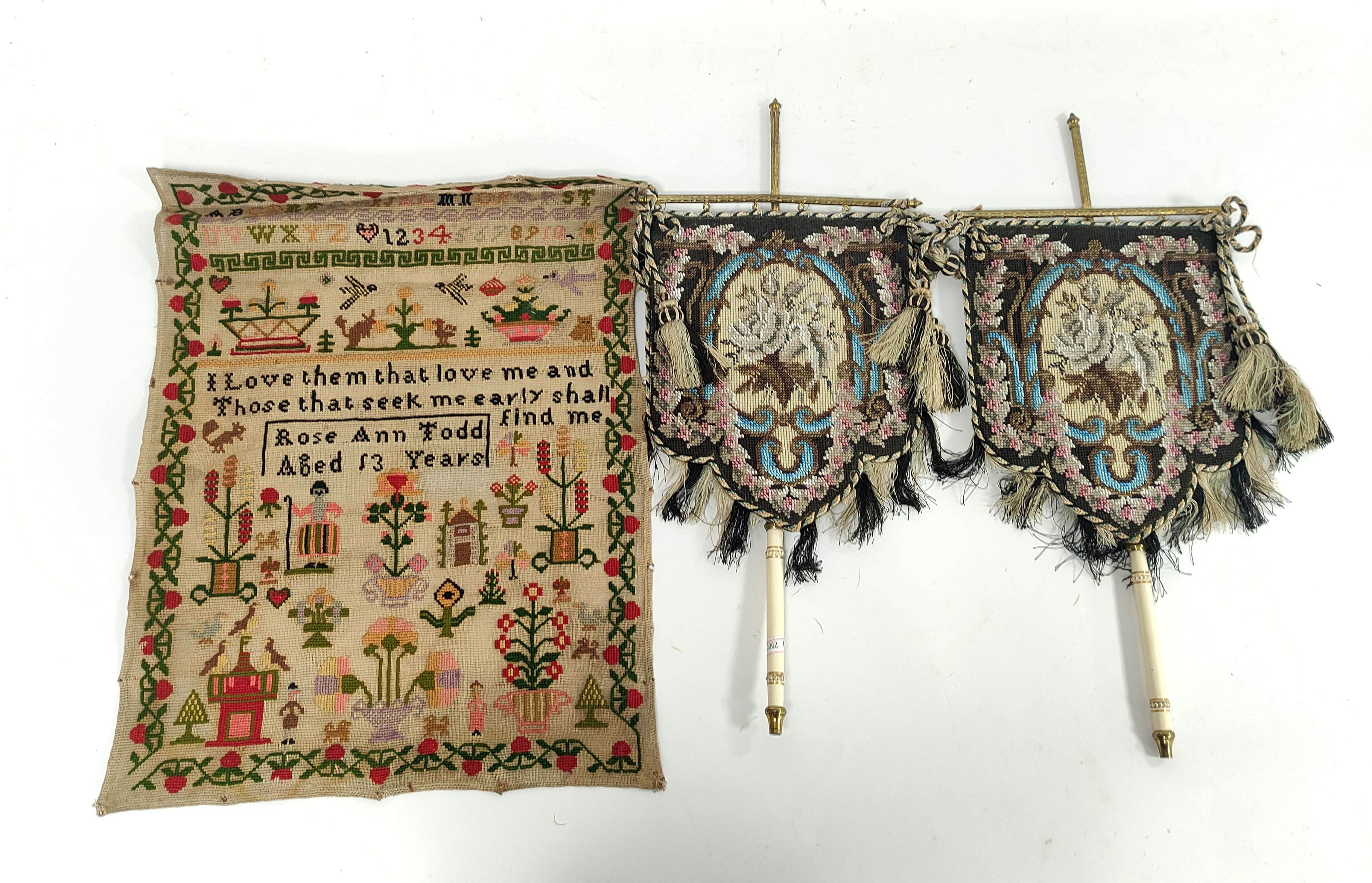 Pair of Victorian style beadwork face screens, with turned handles, cream over-painted gilt metal
