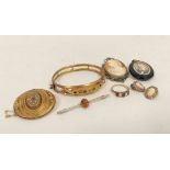 Victorian gold and onyx mourning brooch, with pearl spray, a gilt metal brooch and bangle, and other