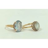 Aquamarine oval ring, and another, both 9ct gold, sizes 'O' and 'P½'.  (2)