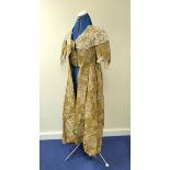 18th century sack-back gown or robe à la Française, in gold and cream silk brocade with lace