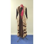 Late Victorian lady's dress, in brown velvet and cafe au lait spotted silk, with tiered ruched