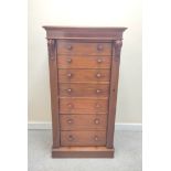 Victorian mahogany Wellington chest, with seven graduated drawers, turned knob handles, raised on