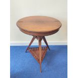 Edwardian inlaid rosewood sewing table, the two section circular top opening to reveal a blue velour