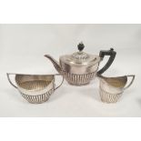 Silver three piece individual tea set of half fluted boat shape, Sheffield, 1895, 412g.