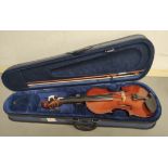 Modern 4/4 size violin unattributed. Spruce top and two piece maple back. Complete with case and