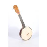 Cased four string banjo ukulele by Down South British Makers, 52cm long.
