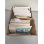 Two boxes containing a large quantity of Guernsey first day covers and stamp booklets.