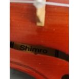 Modern 4/4 size violin by Shimro Korea. Spruce top and two piece back. Complete with case and bow.