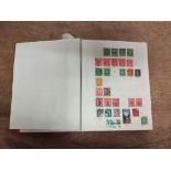 Great Britain. Commonwealth and World postage stamp album including Victorian penny reds, early