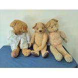 Three early to mid 20th century mohair teddy bears with articulated limbs, including two with
