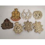 Collection of cap badges with examples to include a WW2 era Royal Highland Regiment of Canada (