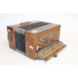 Italian accordion by Cav Settimio Soprani and Figli in wooden body and label.