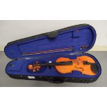 Modern 1/2 size violin by Stentor. Spruce top and two piece back. Complete with case and bow.