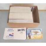 Box containing a large quantity of Jersey first day covers and stamp booklets.