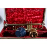 Selmer of Paris Invicta two tone trumpet serial number 87499 and sheet music.