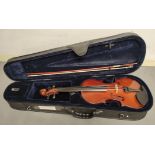 Modern 4/4 size violin unattributed. Spruce top and two piece maple back. Complete with case and