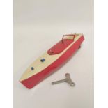 Hornby Meccano. Tin plate Speedboat Racer No 2, with clockwork motor, red hull and cream top,