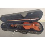 Modern 3/4 size violin unattributed. Oil varnished spruce top and two piece maple back. Complete