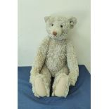 Steiff 1994 Limited Edition '1908 Model' growler bear in white mohair with articulated limbs.