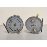 Two antique 1920s nickel alloy casting reels the first by William Robertson of Glasgow with twin