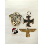 German Militaria Interest- Collection of badges to include a WW1 era Iron Cross second class, a