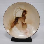 Rosenthal of Bavaria porcelain charger depicting a portrait of a maiden, on painted hardwood