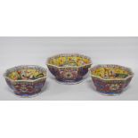 Three Chinese porcelain Qianlong (1711 - 1799) famille rose octagonal bowls, red seal mark to the