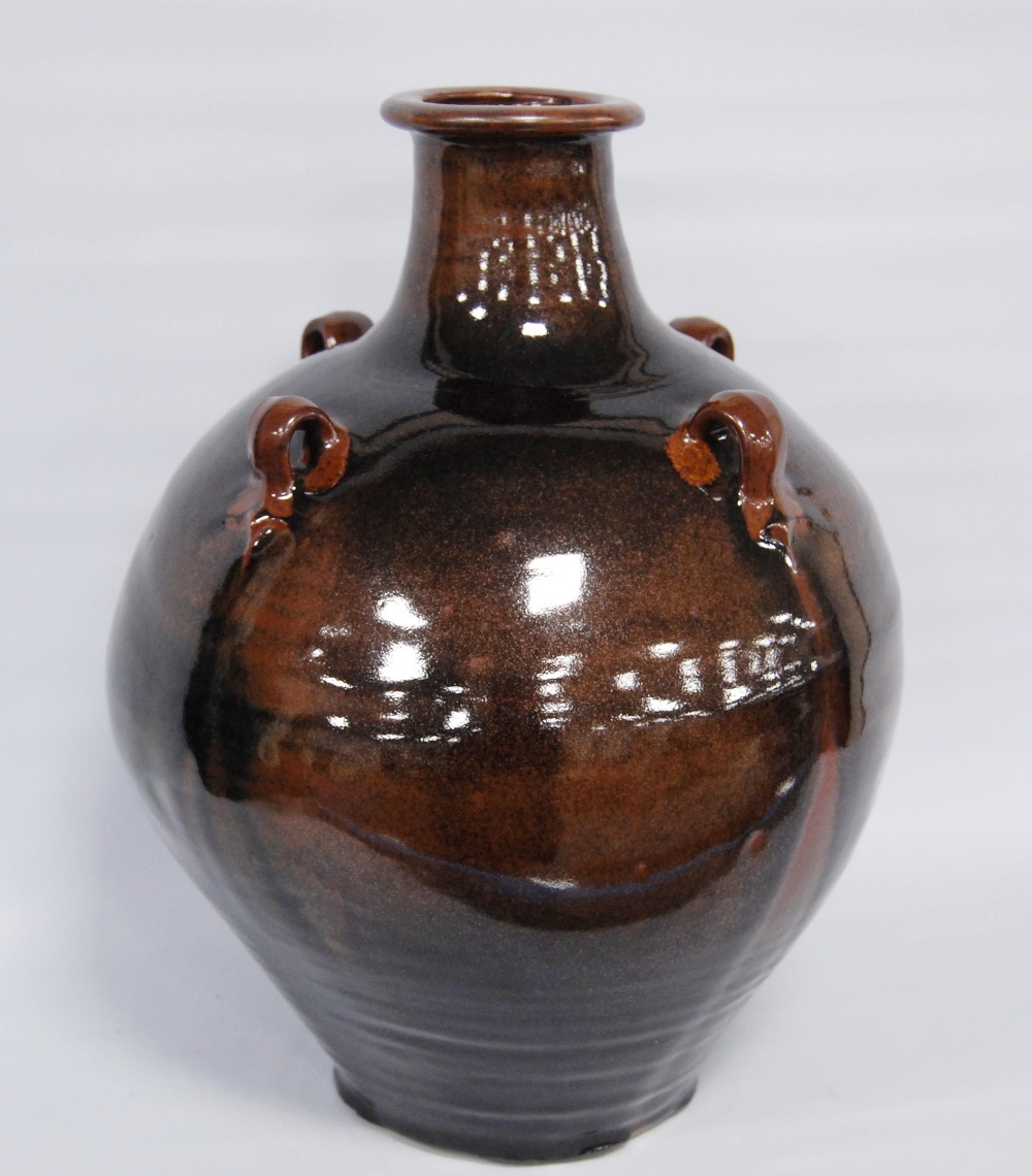 David Leech (English, 1911 - 2005) Treacle glazed studio pottery bowl of baluster shape with four