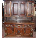 19th century oak dresser, the breakfront top section with four panelled doors enclosing a shelved