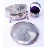 Engraved silver trinket box, an engine turned compact and a pin cushion.  (3)