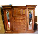 Victorian mahogany breakfront combination wardrobe, with detachable cornice above a cupboard door
