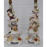 Pair of Meissen-style continental porcelain table lamps, c. early 20th century, modelled as a male